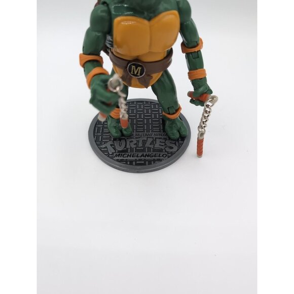 TMNT 7" Action Figure Michelangelo Teenage Mutant Ninja Turtles with Weapons - Picture 3 of 3